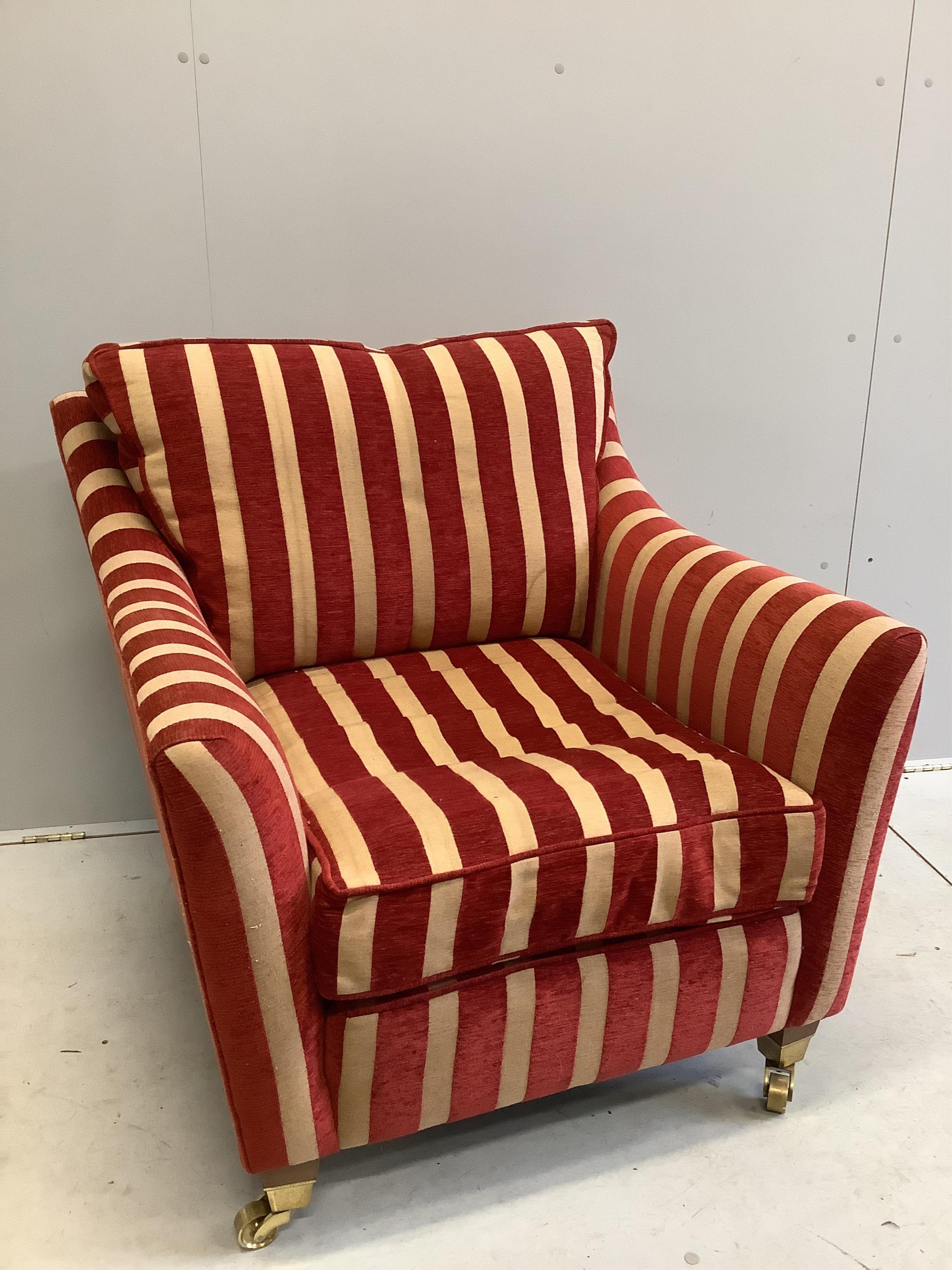 A Contemporary club armchair upholstered in Colefax & Fowler striped fabric, width 88cm, depth 89cm, height 93cm. Condition - fair